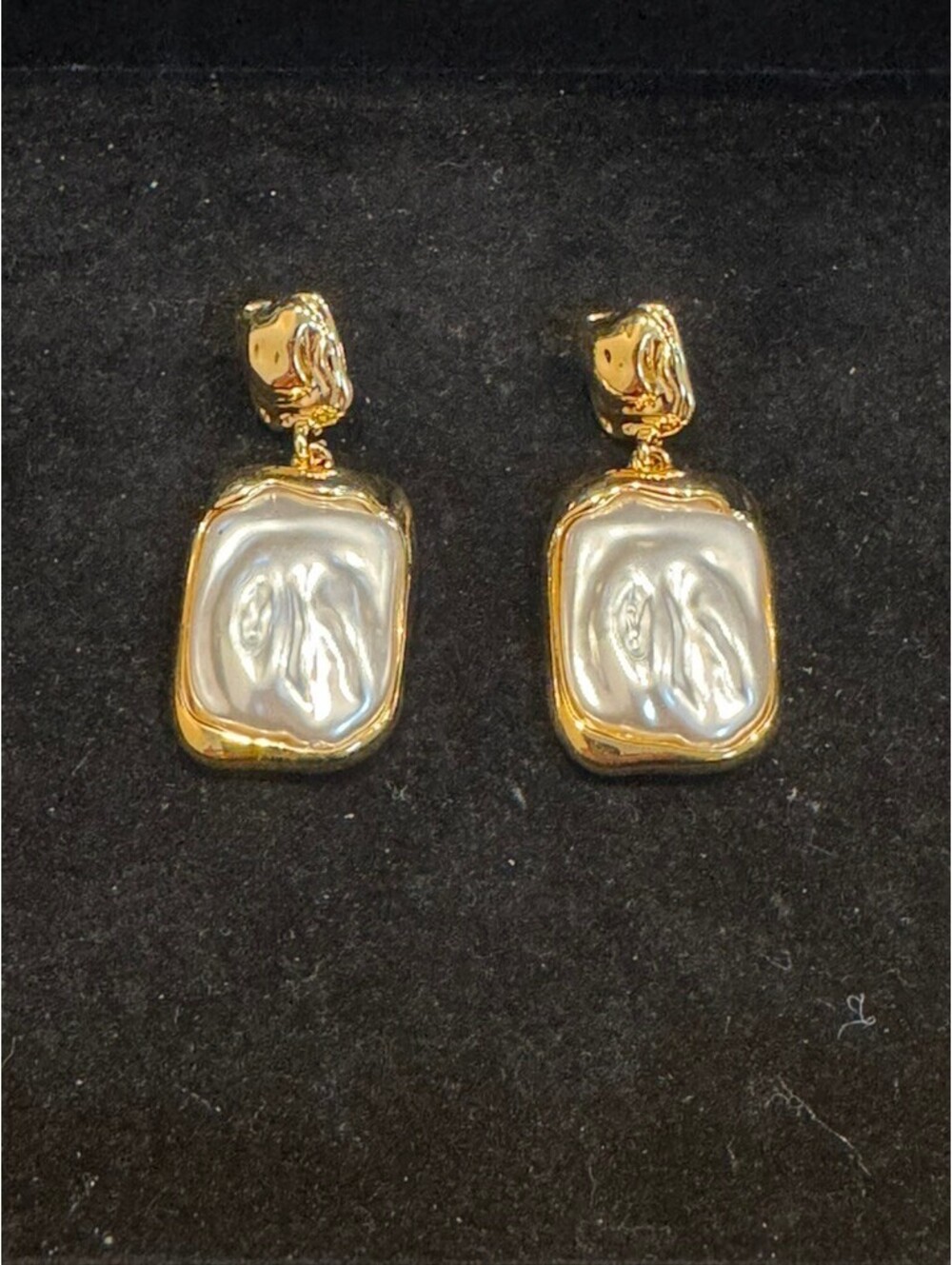Elegant Gold-Tone Earrings with White Pearl-Like Centerpiece